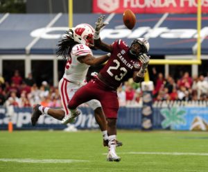 Jan 1, 2014; Orlando, FL, USA; South Carolina Gamecocks wide receiver Bruce Ellington (23) makes a catch in front of Wisconsin Badgers safety Dezmen Southward (12) in the Capital One Bowl at Florida Citrus Bowl. Credit: David Manning-USA TODAY Sports