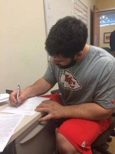 May 14, 2013; Kansas City, MO.; OT Laurent Duvernay-Tardif signing his contract Wednesday. Credit: Laurent Duvernay-Tardif's official Facebook fan page.
