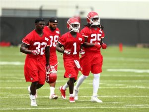 June 17, 2014; Kansas City, MO; Chiefs rookie RB De’Anthony Thomas (1) warms up with fellow rushers on Day One of minicamp. Photo used with permission from Chiefs PR. Credit: KCChiefs.com.