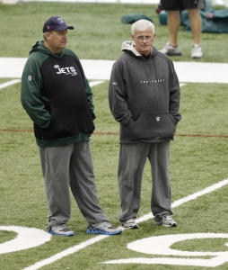 December 21, 2011; Florham Park, NJ; Jets head coach Rex Ryan (left) speaks with then-linebackers coach Bob Sutton (right) during practice. Credit: Tim Farrell/THE STAR-LEDGER via USA TODAY Sports