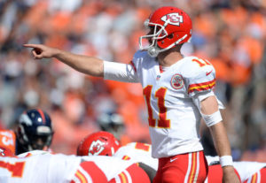 Sep 14, 2014; Denver; Chiefs quarterback Alex Smith (11) calls out signals at the line of scrimmage against the Denver Broncos at Sports Authority Field at Mile High. Credit: Ron Chenoy-USA TODAY Sports