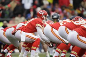 Kansas City Chiefs quarterback Alex Smith (11) calls an audible in the first half of an NFL football game against the Seattle Seahawks in Kansas City, Mo., Sunday, Nov. 16, 2014. (AP Photo/Charlie Neibergall)