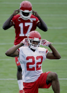 July 29, 2015; St. Joseph, MO; Chiefs cornerback Marcus Peters (22) and wide receiver Chris Conley (17) warming up during training camp. (AP Photo/Charlie Riedel)