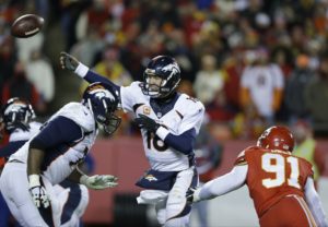 Nov. 30, 2014; Kansas City, MO: Chiefs outside linebacker Tamba Hali (91) applies pressure as Broncos quarterback Peyton Manning (18) throws a pass at Arrowhead Stadium. (AP Photo/Ed Zurga)