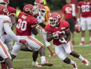 Aug. 18, 2015; St. Joseph, MO: Chiefs running back Darrin Reaves (32) runs with the ball during a training camp drill at Missouri Western State University. (Emily DeShazer/The Topeka Capital-Journal)