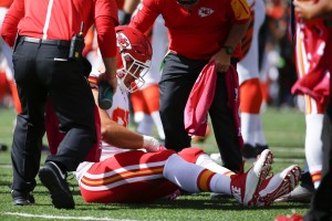 Oct. 4, 2015; Cincinnati; Chiefs trainers tend to inside linebacker Josh Mauga in the first half against the Bengals at Paul Brown Stadium. (AP Photo/Paul Sancya)