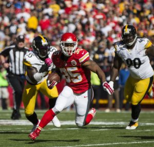 Chiefs running back Chacandrick West runs through the Steelers' defense on Sunday at Arrowhead Stadium. The Chiefs won 23-13 to snap a five-game losing streak.
