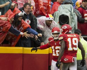 Dec. 13, 2015; Kansas City, MO; Chiefs wide receiver Albert Wilson (12) celebrates a touchdown with the crowd and Jeremy Maclin (19) against the San Diego Chargers at Arrowhead. (Emily DeShazer/The Topeka Capital-Journal)