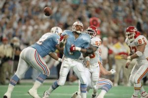 Jan. 16, 1994; Houston; Chiefs linebacker Derrick Thomas (58) forces a fumble after sacking Oilers quarterback Warren Moon at the Astrodome. (AP Photo/Rick Bowmer)