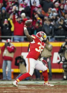 Jan. 3, 2016; Kansas City, MO; Chiefs running back Spencer Ware (32) celebrates after scoring a touchdown against the Oakland Raiders at Arrowhead Stadium. (Emily DeShazer/The Topeka Capital-Journal)