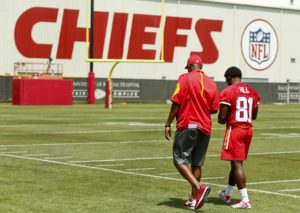 May 7, 2016; Kansas City, MO; Chiefs rookie wide receiver Tyreek Hill departs the practice field with a team representative after talking to reporters. (Chris Neal/The Topeka Captial-Journal)