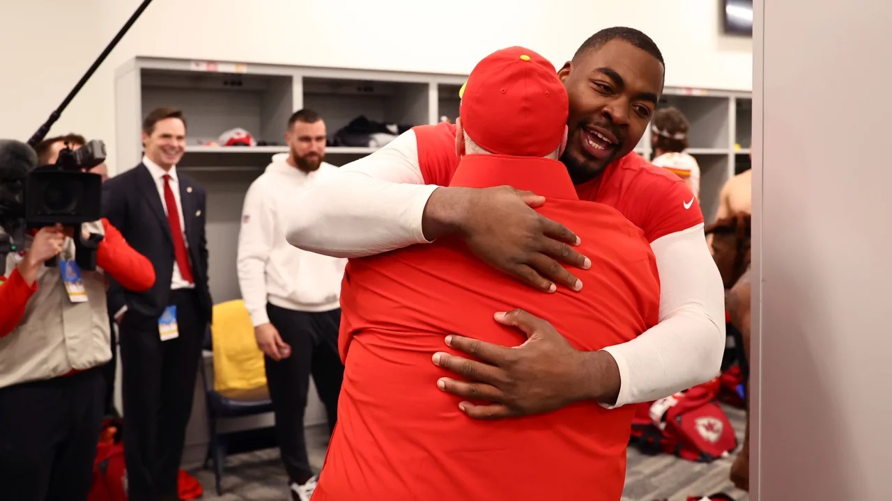 Chiefs head coach Andy Reid gives a hug to defensive tackle Chris Jones following the team's 13-12 win over the Los Angeles Chargers at SoFi Stadium on Jan. 7, 2024. 